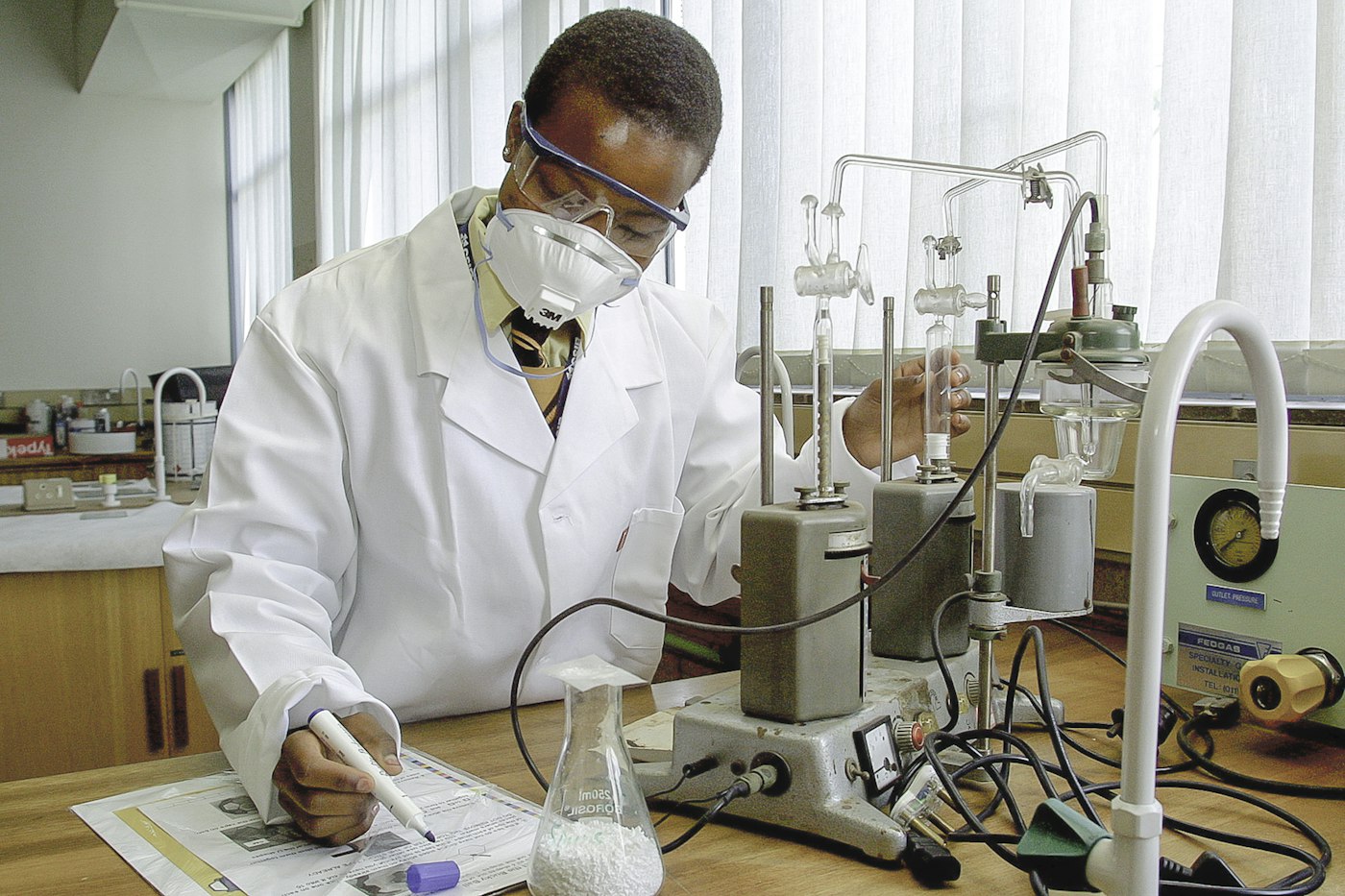 A researcher working in an OAU laboratory
